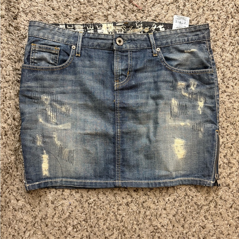 Ripped denim jean mini skirt